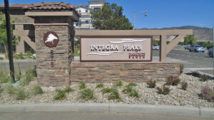 Large outdoor monument sign for Integra Peaks apartments.