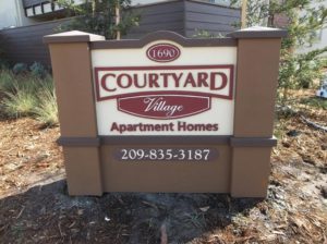Courtyard Village Apartments Monument Signs