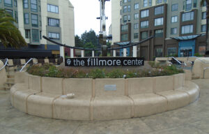 Curved base sign with dimensional lettering placed on a curve.