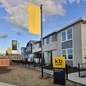 KB Home's banner flag and Sales Center sign.