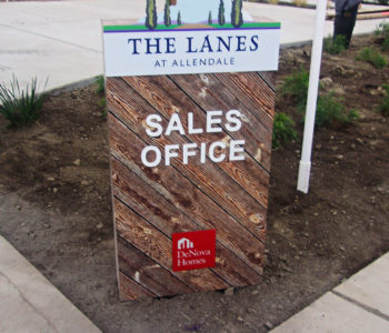 Wood sign identifying the location of the Sales Office