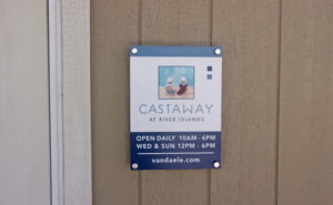Small sign on wall displaying the house of operations for Castaway property.