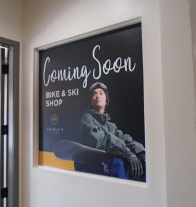 Advertisement on window showing the new "Ski Shop Opening Soon".