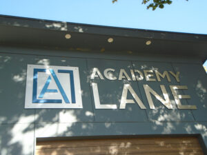 Dimensional Academy Lane logo on Exterior Wall