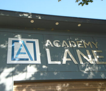 Dimensional Academy Lane logo on Exterior Wall