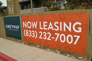 Banner Fence with "Now Leasing"
