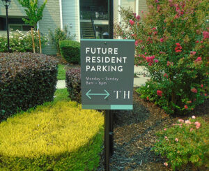 A sign for future residents parking for The Hills.